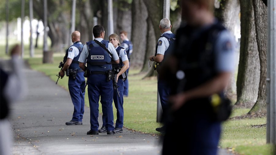 Police across the street from the mosques attacked in New Zealand shortly after the attack. (AP Photo/Mark Baker)