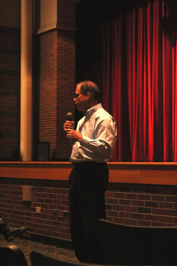 Senator Mike Braun stands in front of the 69 AP Government seniors attending the event after being walked down by 4 students, principal Dr. Ginkins, teacher Pierce Mumaw, and administrator Jamie Crick.