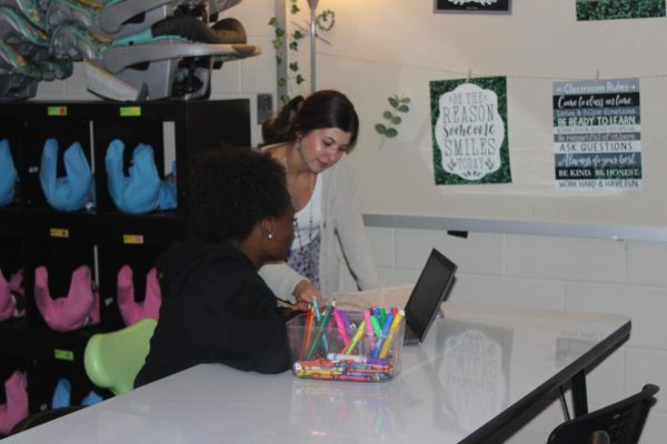 Mrs. Carson working with students. 