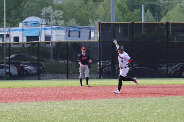 Senior Tyler Hubbard celebrates another homerun. Photo by Shelby Moore