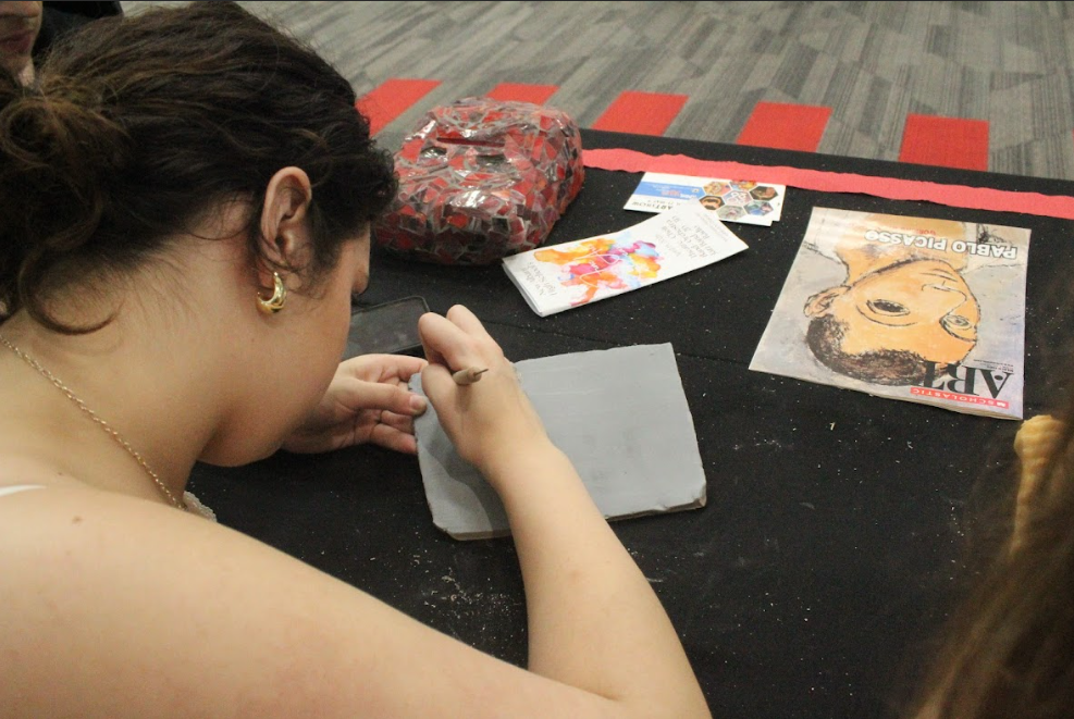 Sophomore Madilyn Daily during the ceramics demonstration 