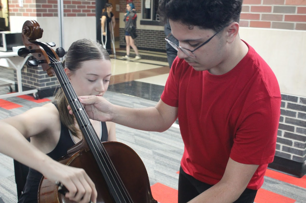 NAHS Orchestra teaching an instrumental demonstration