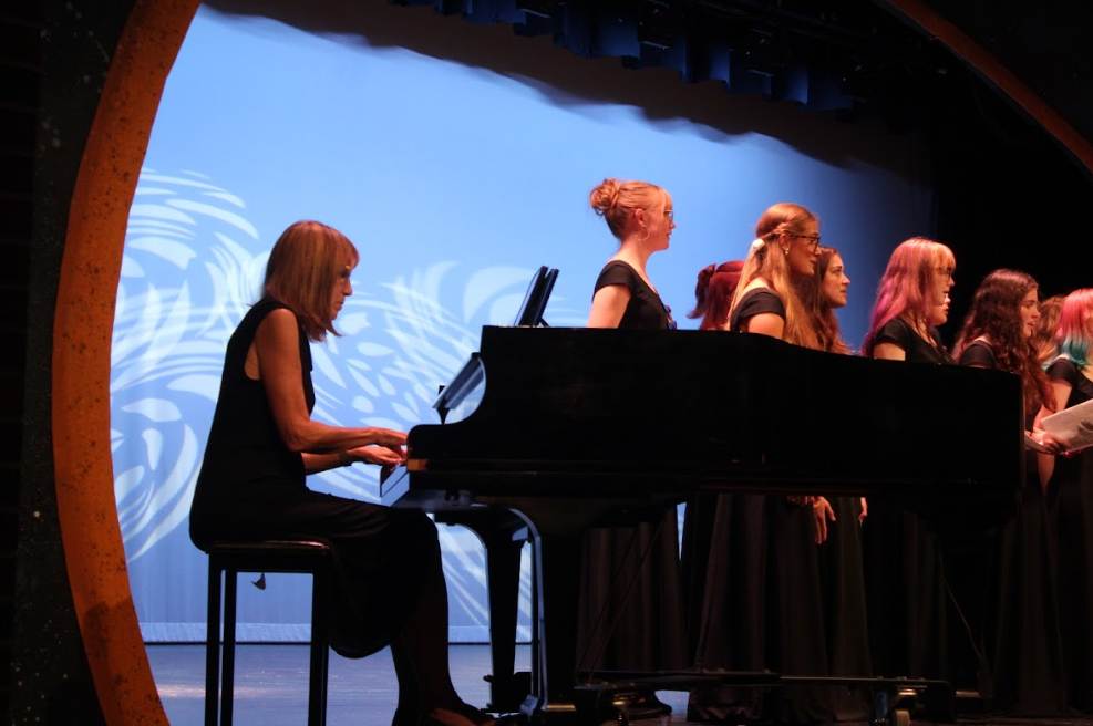 "Mama McCoy" accompanying the NAHS Choir